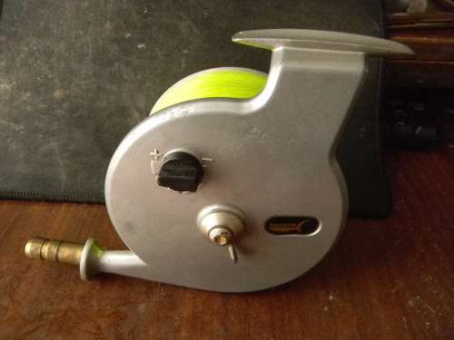 magnum sport fishing reel in good condition with line postage R110.00