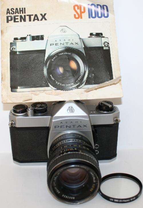 Pentax SP 1000 with APS Auto Teleplus 2X and Owners Manual.