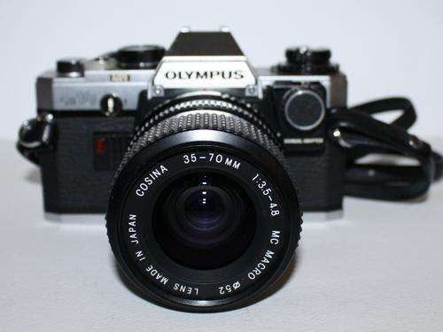 Olympus OM 10-Cosina 35-70mm1:3.5-4.8 MC Macro 52 Lens made in Japan.