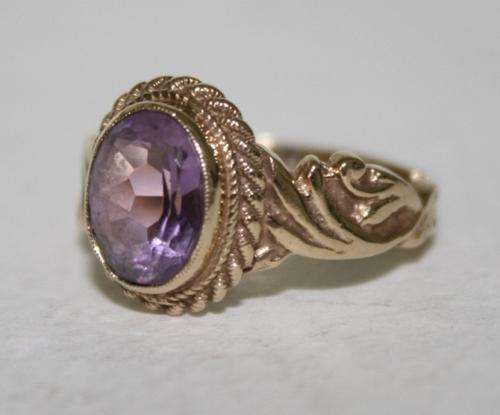 Amethyst Set in Gold Setting.