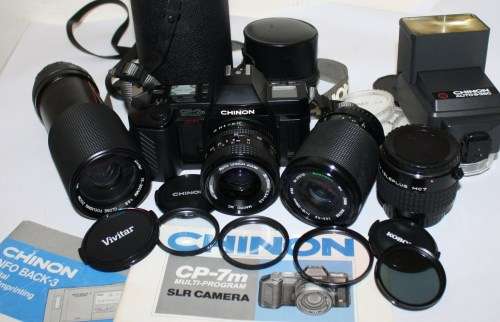Chinon CP-7m *Multi Program* SLR Camera with Combo Lenses etc..As per Photos