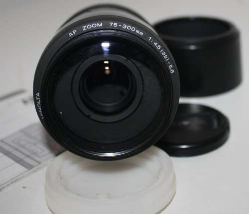 ** Minolta AF 75-300 Zoom Lens**....Got "Slight"Funges  on 'Front' Lens