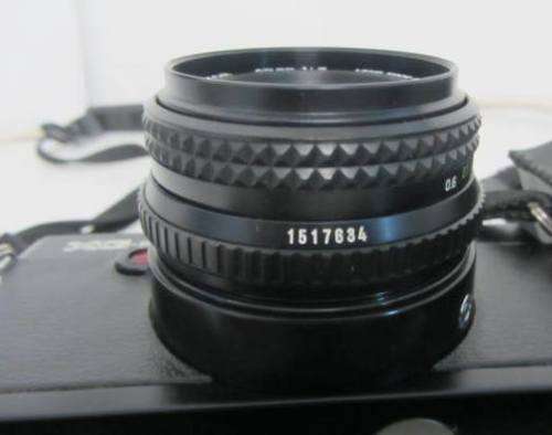 **Minolta XG-SE-Black**including Minolta Auto Winder G...MD Rokkor 45mm 1:2 Lens.