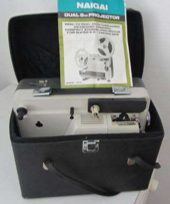 **Dual 8mm Projector*Naigai-Model 904....Complete in Original Box...Turns on and Runs....No Globe.