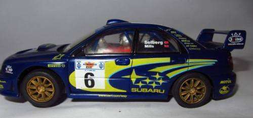 **Scalextric**Subaru Impreza WRC."Solberg Mills-6".As per Photos ...Not tested