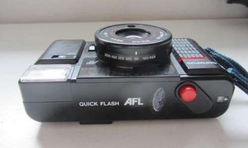 **Olympus AFL**-Quick Flash 35mm Camera0Zuiko 38mm f 2.8 Lens..Needs Battery..Not tested