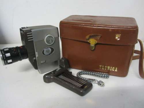 **Yahica 8-E** 8mm Movie Camera....Yashica Zoom 1:2.8 f=12.5-37.5mm Zeica Lens..Turning when Winded.
