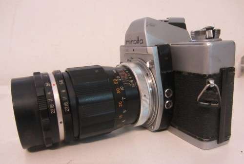 **Minolta SRT-101**S.L.R. 35mm Film Camera-Cunor Tele-Lens1:3.5 f=135mm Lens