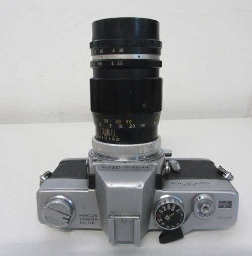 **Minolta SRT-101**S.L.R. 35mm Film Camera-Cunor Tele-Lens1:3.5 f=135mm Lens