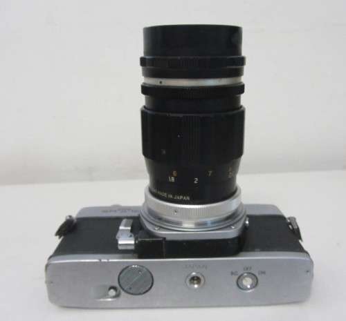 **Minolta SRT-101**S.L.R. 35mm Film Camera-Cunor Tele-Lens1:3.5 f=135mm Lens