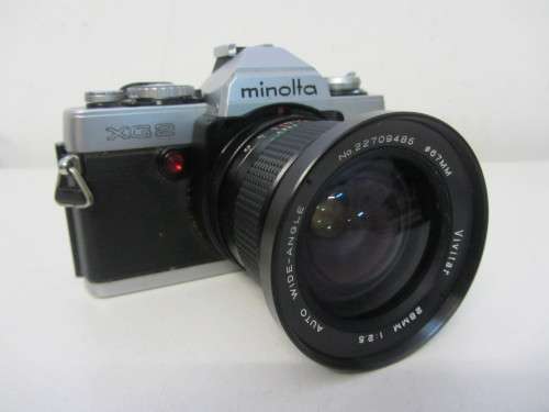 **Minolta XG-2**-Auto Wide-Angle 28mm 1:2.5 Vivitar Lens Plus Vivitar 70-150mm 1:3.8 Auto Zoom Lens
