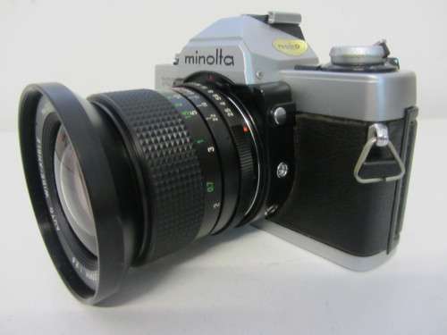 **Minolta XG-2**-Auto Wide-Angle 28mm 1:2.5 Vivitar Lens Plus Vivitar 70-150mm 1:3.8 Auto Zoom Lens