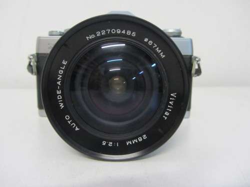 **Minolta XG-2**-Auto Wide-Angle 28mm 1:2.5 Vivitar Lens Plus Vivitar 70-150mm 1:3.8 Auto Zoom Lens