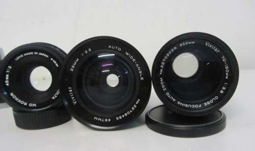 **Minolta XG-2**-Auto Wide-Angle 28mm 1:2.5 Vivitar Lens Plus Vivitar 70-150mm 1:3.8 Auto Zoom Lens