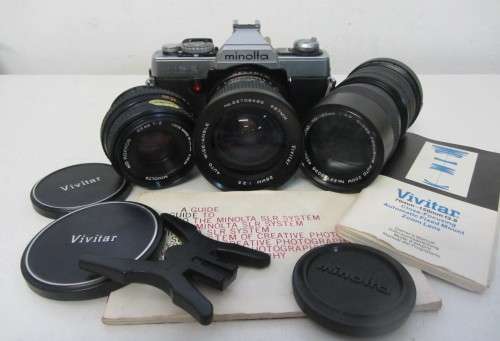 **Minolta XG-2**-Auto Wide-Angle 28mm 1:2.5 Vivitar Lens Plus Vivitar 70-150mm 1:3.8 Auto Zoom Lens