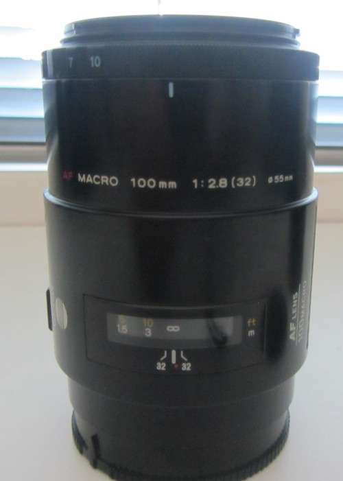 **Minolta AF-100 Macro**100mm 1:2.8(32)55mm Lens....Incl Lens Hood/Caps-As per Photos