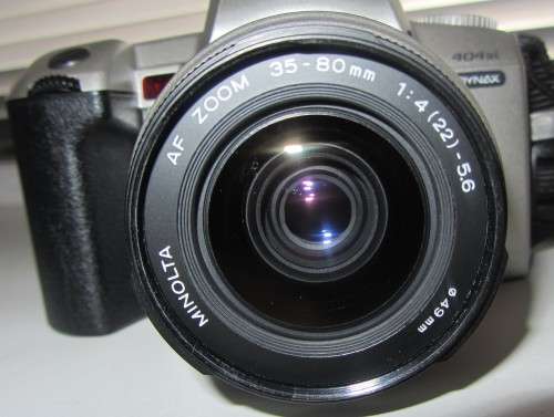 **Minolta 404si**Dynax 35mm S.L.R Camera Incl Tokina AF 100-300mm 5.6-6.7 Lens