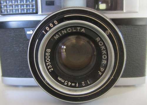 **Minolta AL**35mm Film Camers-Incl Exposure Meter,Instructions,Lens Hood.Original Bag
