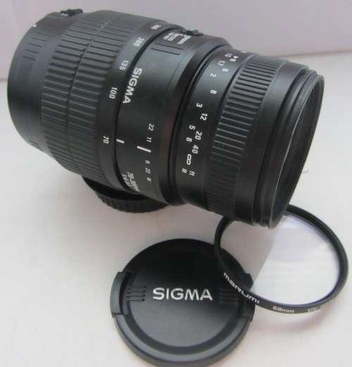 Sigma 70-300mm f1.4-5.6 Macro Lens-For Canon EOS Diginal Camera-Good Condition..Incl Marumi UV Haze