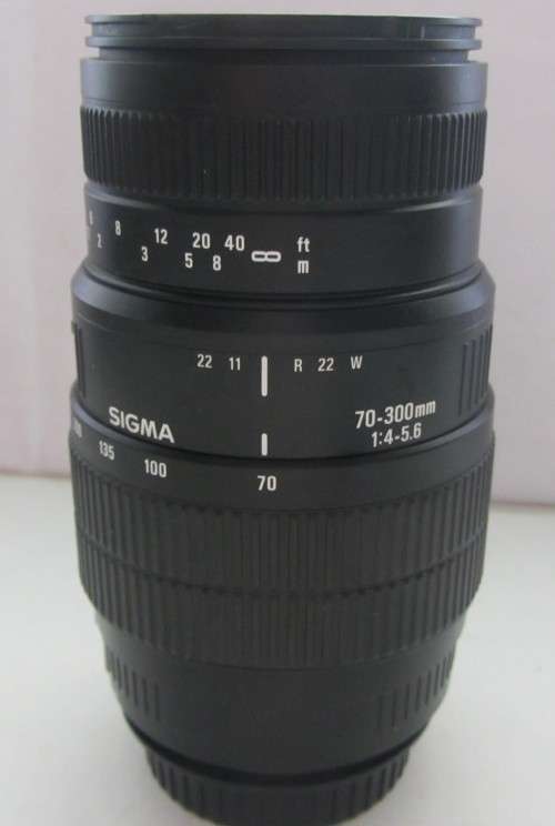 Sigma 70-300mm f1.4-5.6 Macro Lens-For Canon EOS Diginal Camera-Good Condition..Incl Marumi UV Haze