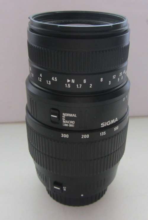 Sigma 70-300mm f1.4-5.6 Macro Lens-For Canon EOS Diginal Camera-Good Condition..Incl Marumi UV Haze