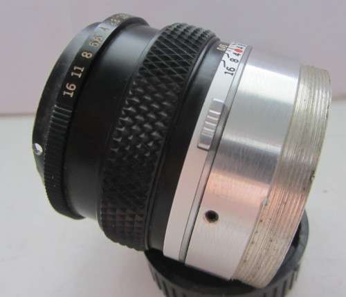 Olympus OM-System Zuiko Mc Auto-S f1.8 50mm-AS per Photos.