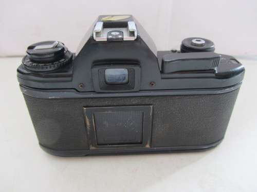 Nikon EM SLR-Nikkor 50mm 1:2 Nikon Lens(needs cleaning)Shutter Fires Smoothly