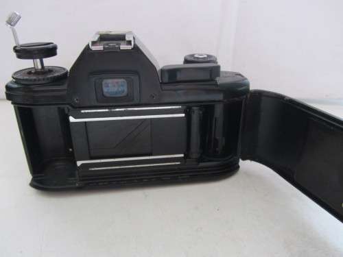 Nikon EM SLR-Nikkor 50mm 1:2 Nikon Lens(needs cleaning)Shutter Fires Smoothly