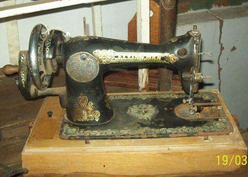 ANTIQUE "FLYING MAN" HAND OPERATED SEWING MACHINE