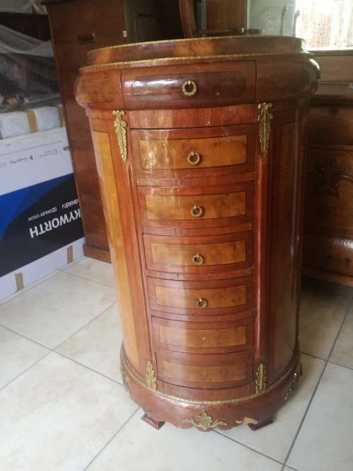Unrestored antique half moon chest of drawers