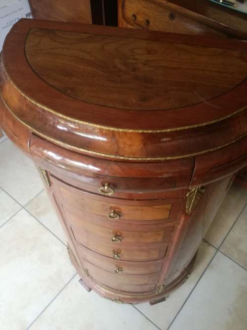 Unrestored antique half moon chest of drawers