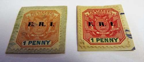 2 X ZAR 1 PENNY STAMPS (RED AND ORANGE )
