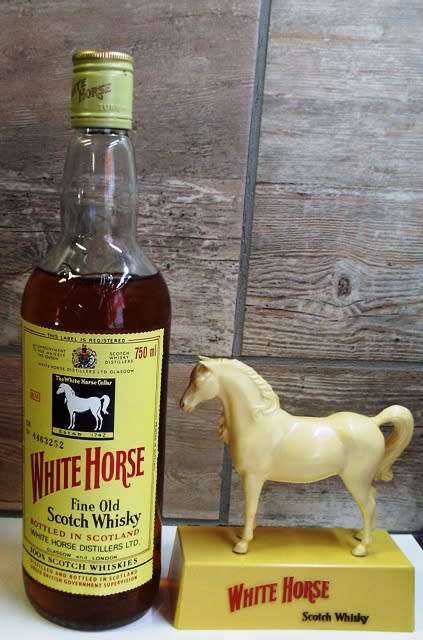 SUPER RARE ,,WHITE HORSE WHISKY  sealed bottle ,,,BOTTLED IN THE 1970s,