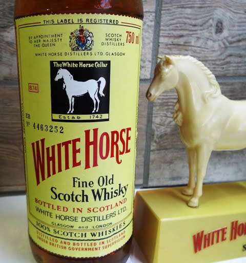 SUPER RARE ,,WHITE HORSE WHISKY  sealed bottle ,,,BOTTLED IN THE 1970s,