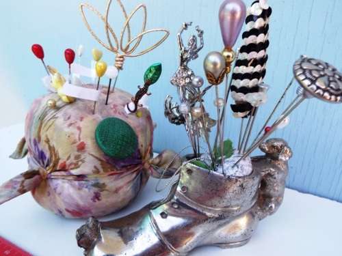 ANTIQUE collection of  hat pins AND 2 holders
