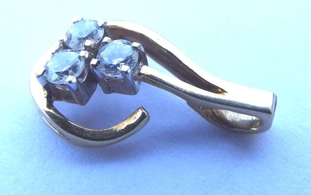 SOLID 9 ct gold  PENDAND WITH 3 REAL 0.1 CT  DIAMONDS EACH