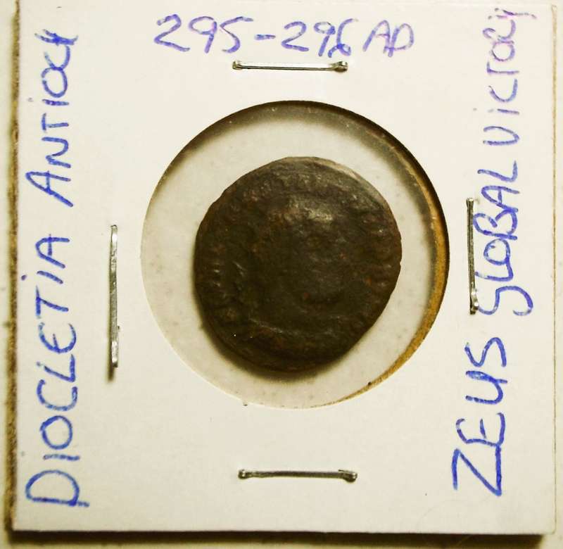 RARE ancient roman diocletia antioc 295-296AD  ZEUS GLOBAL VICTORY coin