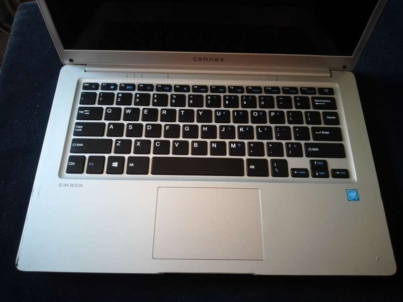 Connex Slim Book L1470 Notebook. Please Read  Before Bidding!