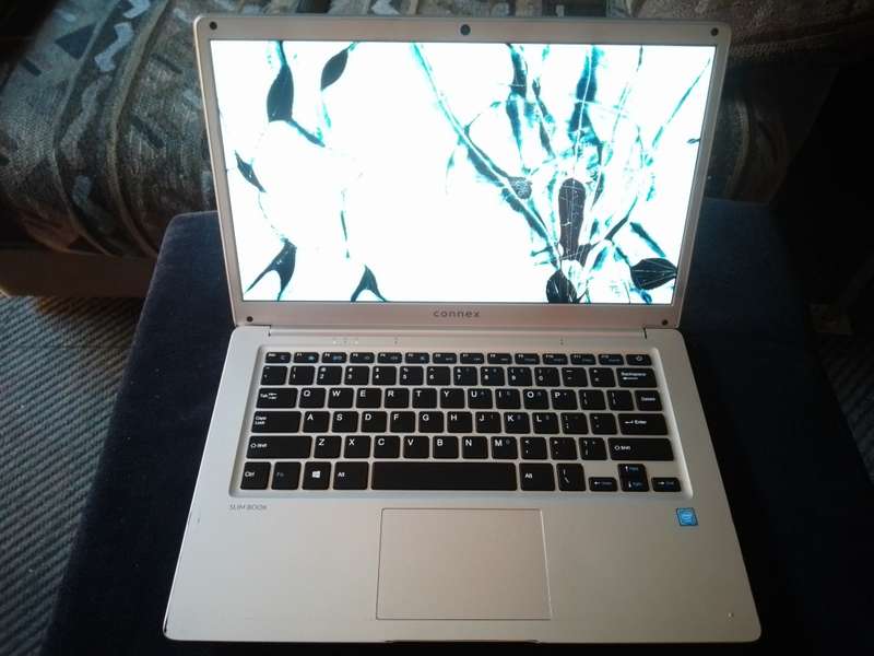 Connex Slim Book L1470 Notebook. Please Read  Before Bidding!
