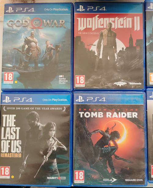 4x PS4 Games - God of War, Wolfenstein ii, The Last of us remastered, Shadow of the tomb raider