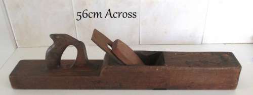 A VINTAGE WOODEN PLANE