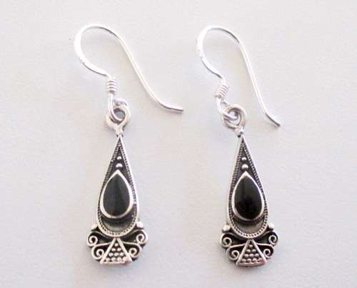 A PAIR OF SOLID SILVER DROP EARRINGS
