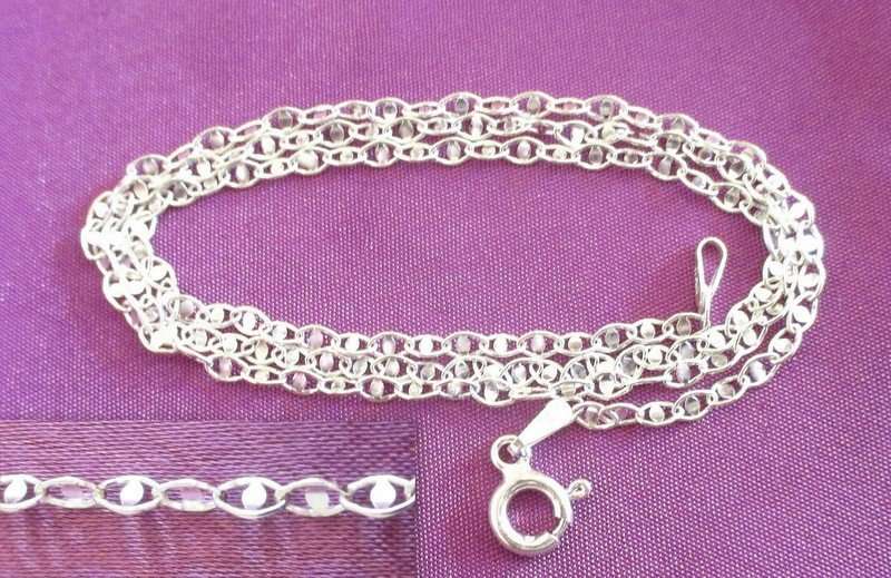A SOLID SILVER 42cm CHAIN WITH INSERTS IN EACH LOOP WHICH GIVE THIS CHAIN A SPARKLING LOOK---NEW