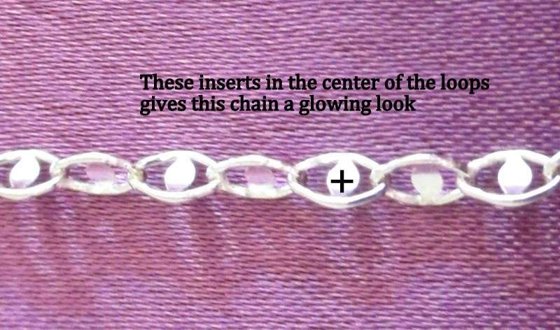 A SOLID SILVER 42cm CHAIN WITH INSERTS IN EACH LOOP WHICH GIVE THIS CHAIN A SPARKLING LOOK---NEW