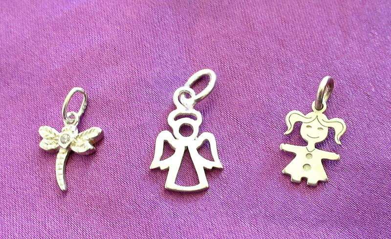 A SOLID SILVER BRACELET CHAIN AND 3 SOLID SILVER CHARMS---NEW