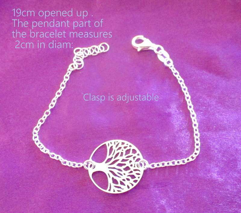 A  SOLID SILVER TREE OF LIFE BRACELET