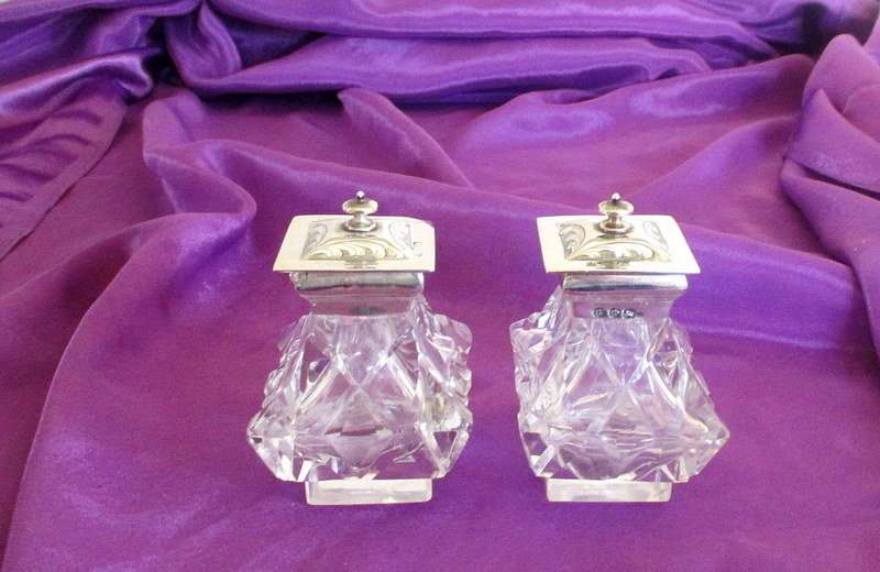 A PAIR OF HALLMARKED SILVER INKWELLS --SHEFFIELD 1858--Please see images and read description.