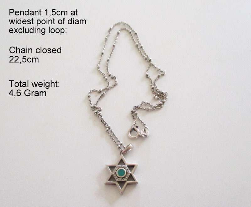 A SOLID SILVER STAR OF DAVID PENDANT ON A SILVER CHAIN WITH GRADUATED BALLS