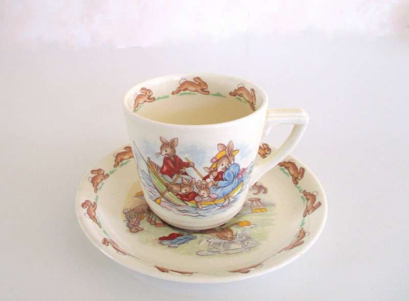 A ROYAL DOULTON BUNNYKINS CUP AND SAUCER---PERFECT (A)