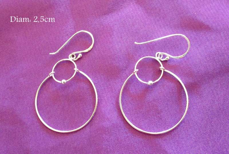 A PAIR OF SOLID SILVER EARRINGS---NEW